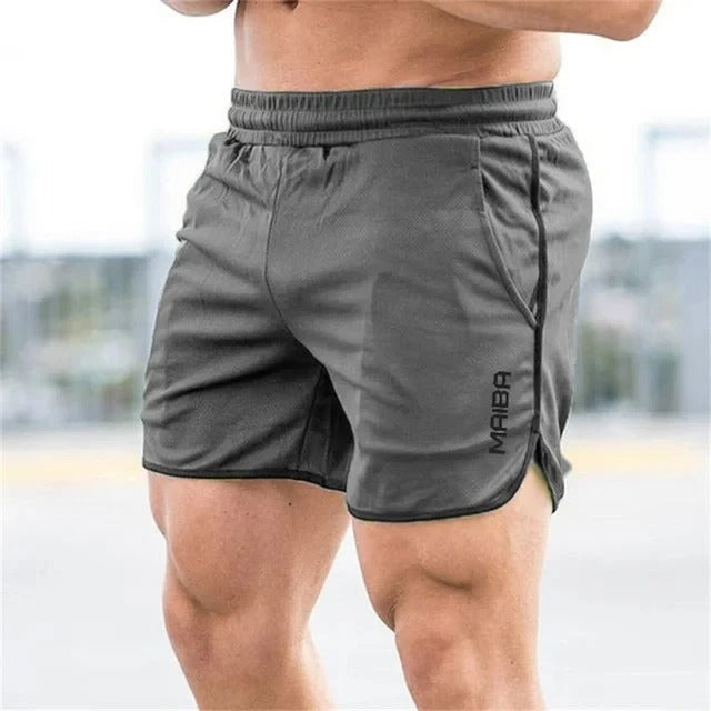 Athletic men's swimwear: slim-fit swim trunks with elastic waist & quick-dry fabric for active use.