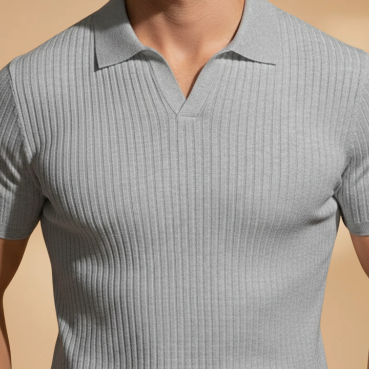 Versatile men's collared polo, featuring a slim fit and ribbed texture for a sleek, polished look.