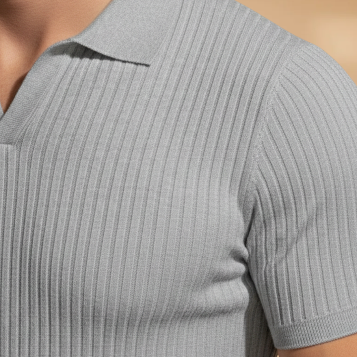 Stylish ribbed polo shirt for men, slim fit silhouette and short sleeves for modern casual fashion.