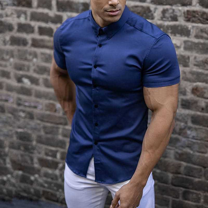 Comfortable men's slim fit short sleeve casual shirt. Button-up design, perfect for warm weather.