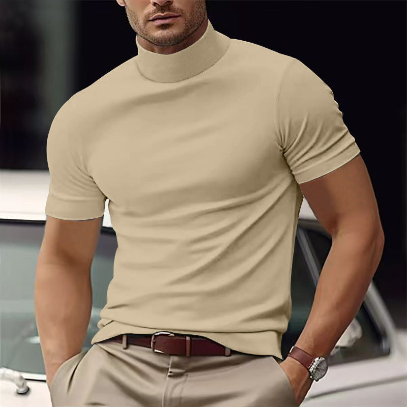 Man wearing a versatile slim fit short sleeve mock neck shirt. Perfect for a stylish, comfortable casual look.