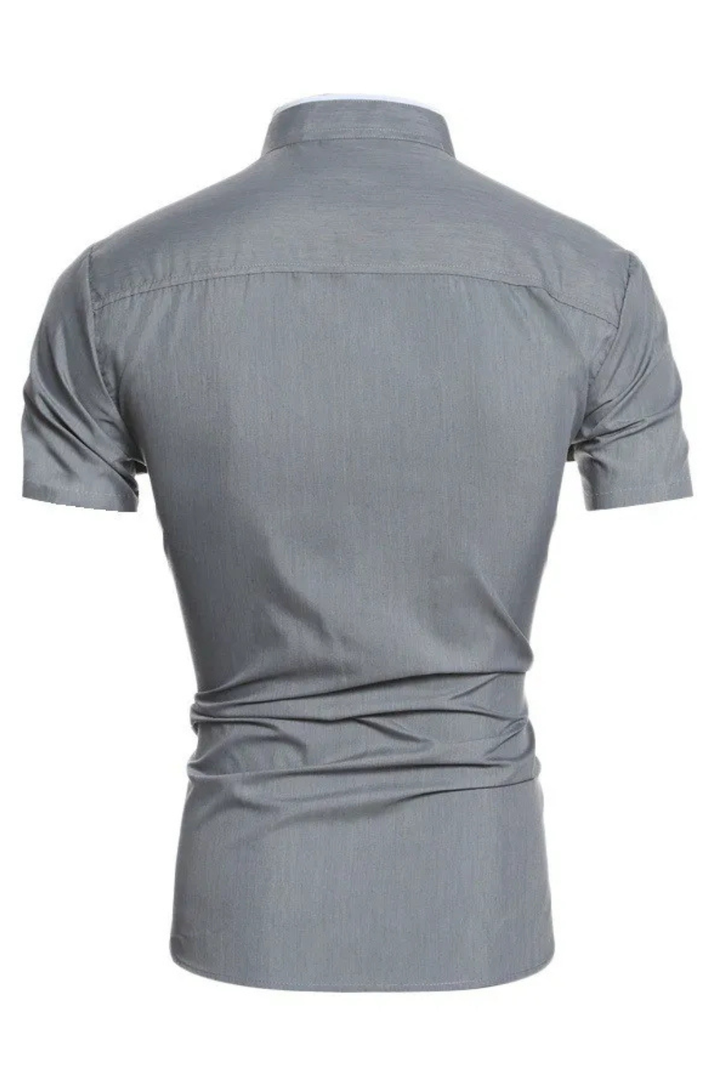 Contemporary men's short sleeve shirt, slim fit design with a distinctive modern stand collar. Essential modern apparel.