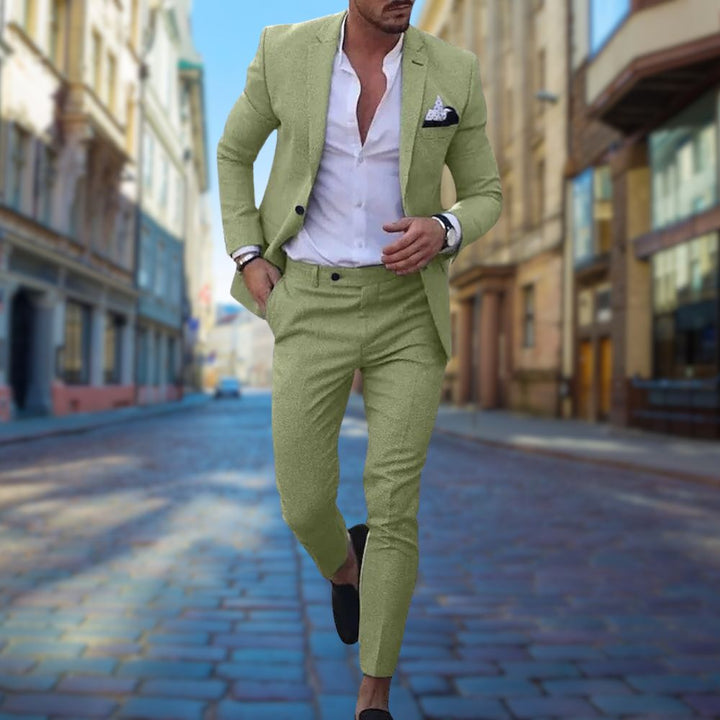 Modern green men's slim fit tailored suit, offering a fashionable and comfortable choice for various occasions.