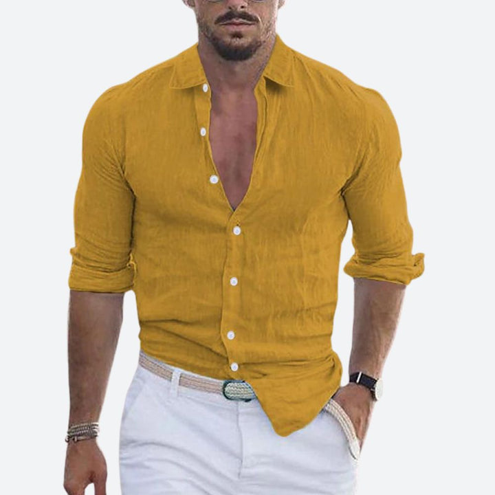 Stylish men's slim fit summer shirt, button-up with open collar. Ideal for smart casual warm weather looks.