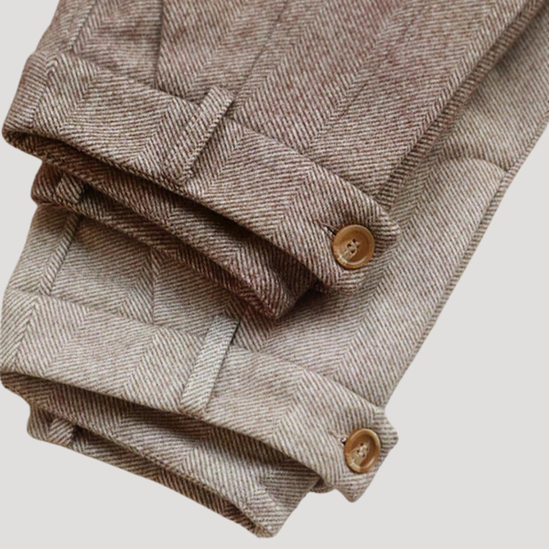 Grey slim fit men's tailored ankle length pants, versatile for smart casual spring outfits.