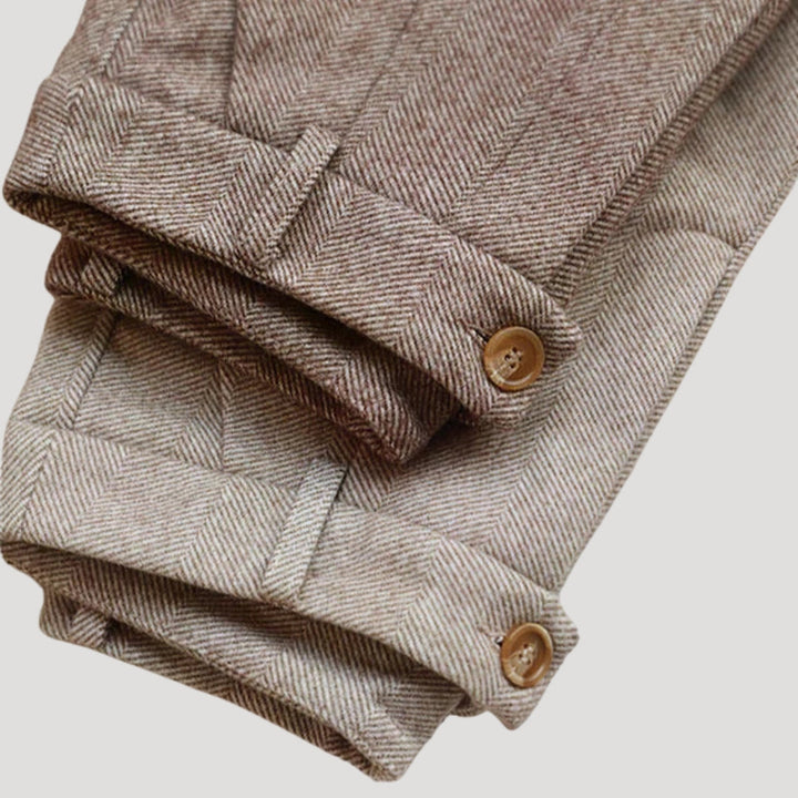 Grey slim fit men's tailored ankle length pants, versatile for smart casual spring outfits.
