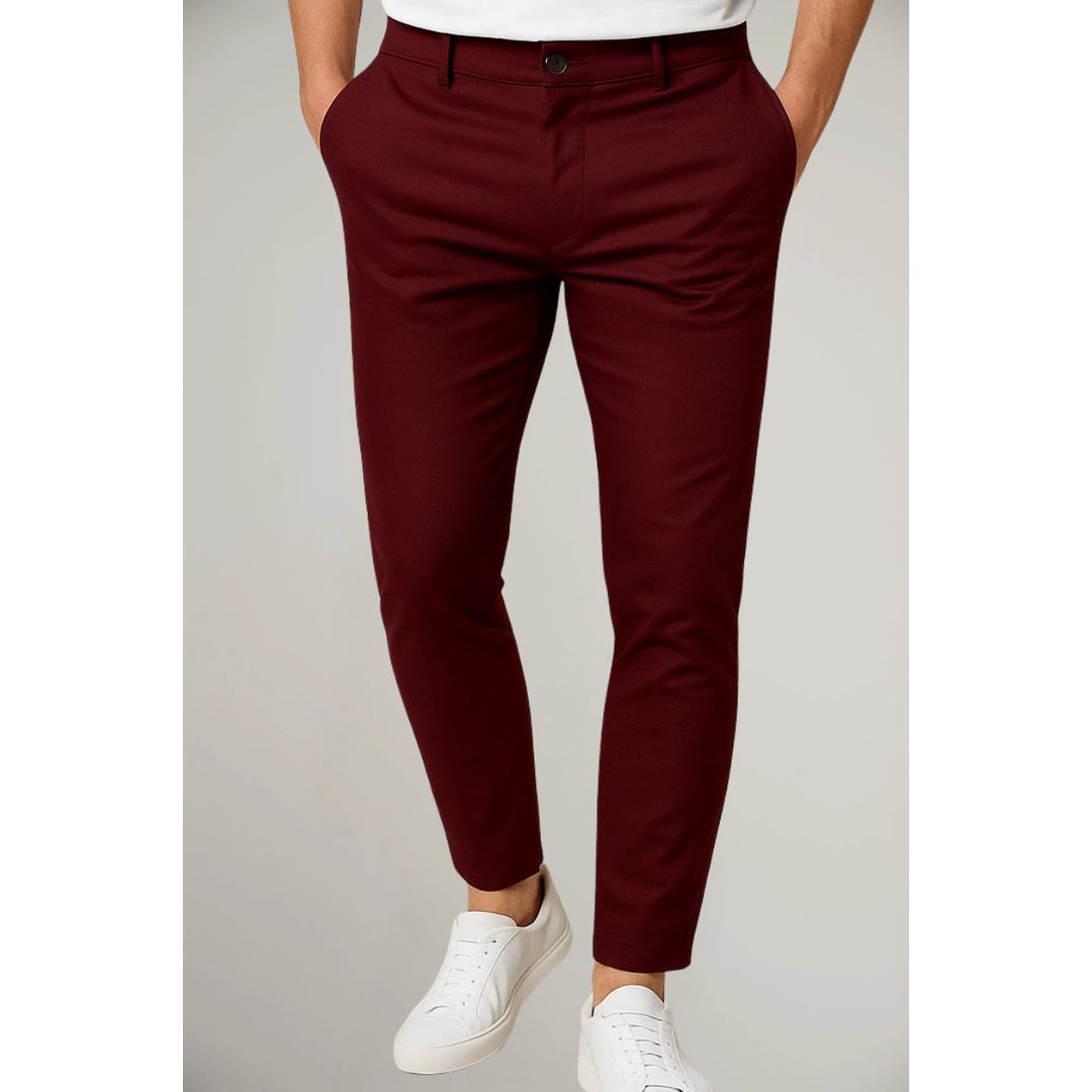 Men's slim-fit tailored navy chino trousers, front view. Versatile smart casual woven pants for everyday style.