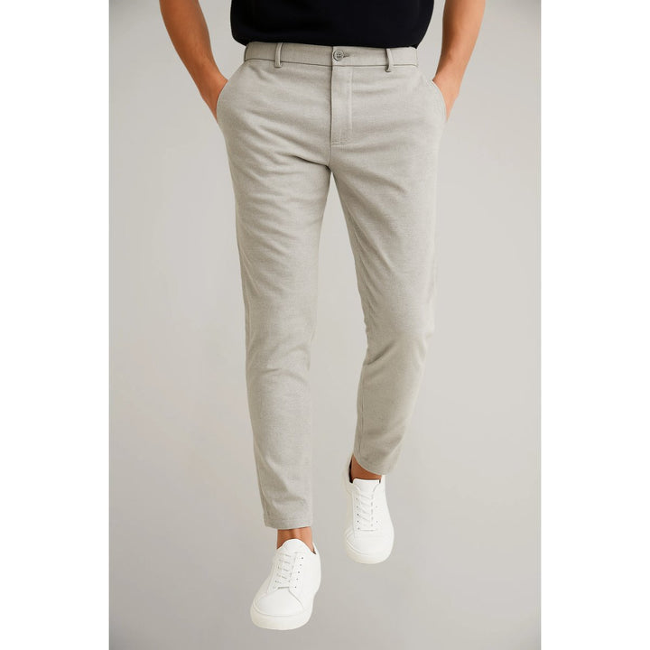 Men's tailored slim-leg chino pants in a neutral tone, ideal for versatile smart casual styling.