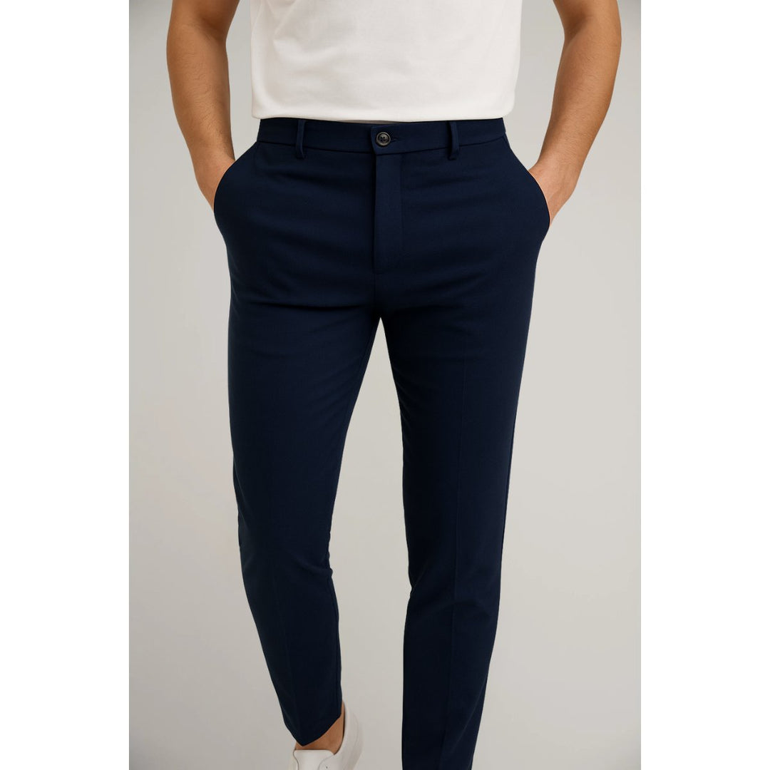 Tailored men's slim-leg chinos in classic black, styled for smart casual office or an evening event.