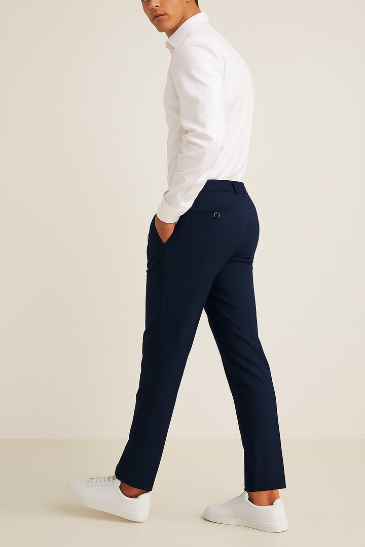 Neatly folded men's versatile slim-fit chino trousers, showcasing the quality fabric and tailored cut.