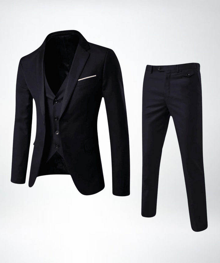 Man wearing a sleek slim fit three-piece suit, presenting a confident and professional image for formal events.