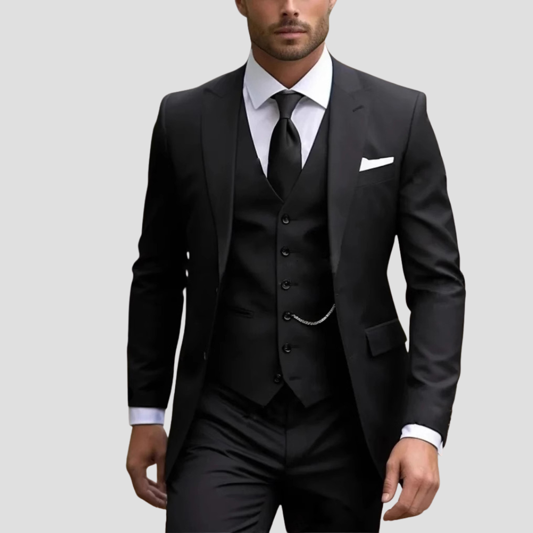 Men's slim fit three-piece formal suit. Tailored jacket, vest & pants for a sharp look.