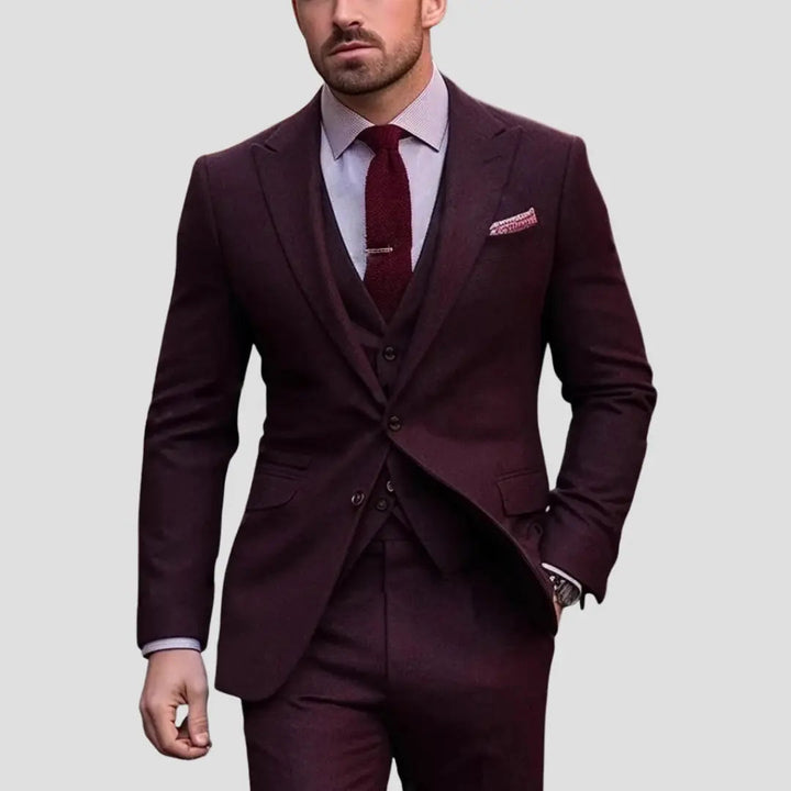 Back view of a stylish men's slim fit three-piece suit, showcasing its modern tailored silhouette for events.