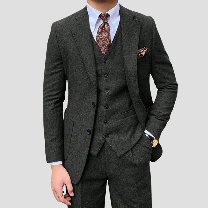 Modern tailored men's slim fit three-piece suit with vest, ideal for a sophisticated look.