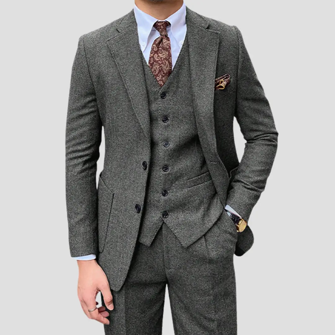 Elegant men's slim fit three-piece suit with vest, perfect wedding or business attire.