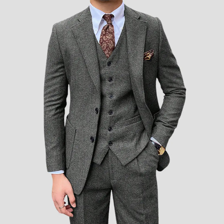 Elegant men's slim fit three-piece suit with vest, perfect wedding or business attire.