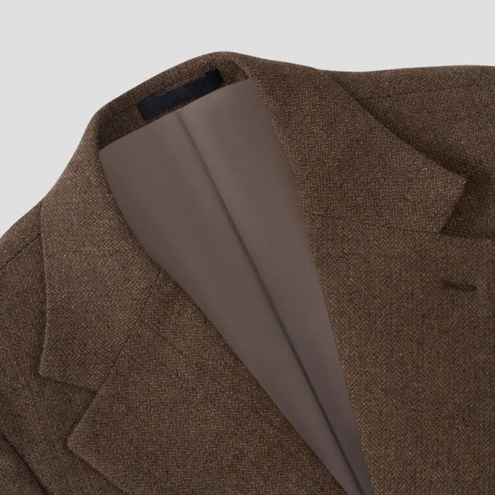 Versatile men's slim fit three-piece suit with vest, suitable for business, weddings & events.