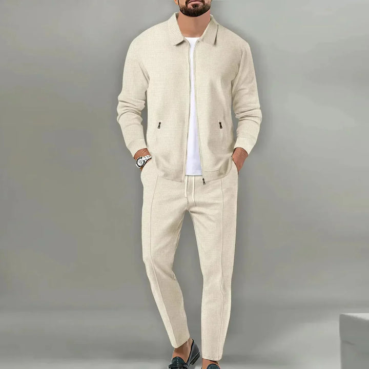 Sharp men's slim fit two-piece formal suit featuring a stylish blazer and trousers for any elegant event.