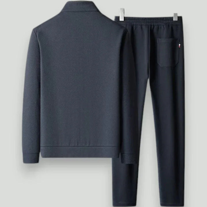 Modern men's slim fit athletic tracksuit. Two-piece set designed for gym, workouts, and stylish casual men's fashion.