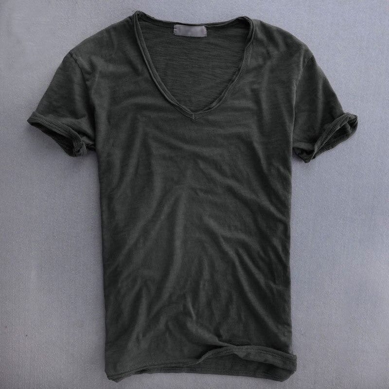 Man wearing a comfortable slim fit V-neck t-shirt, ideal lightweight casual summer top for active wear.