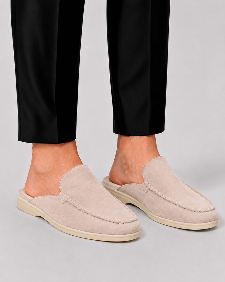 Close-up of men's casual slip-on loafer mules, highlighting the open-back design and lightweight sole for summer.