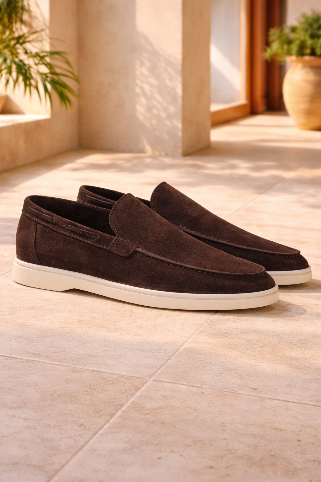 Close-up of men's sleek slip-on loafers. Highlighting minimalist smart casual comfort, quality, and versatile style.