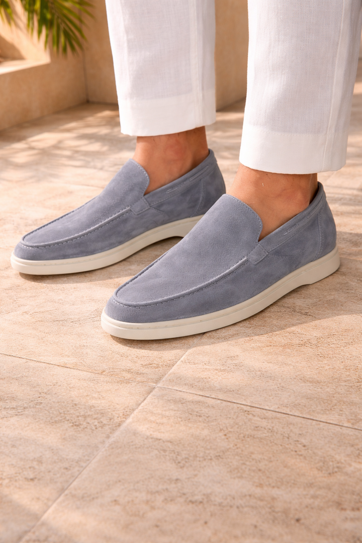 Stylish brown men's slip-on loafers. Smart casual men's footwear with a classic, comfortable, & versatile design.