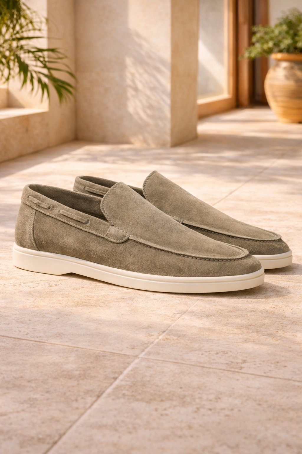 Elegant grey men's slip-on loafers. Minimalist design offers smart casual comfort, versatility, & modern fashion.