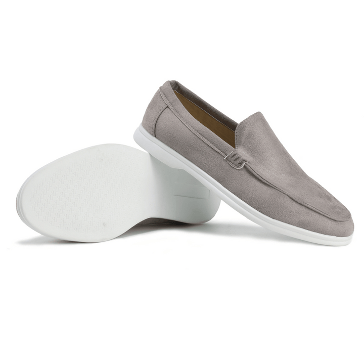 Close-up of men's slip-on loafers, highlighting comfortable texture & supportive memory foam interior.