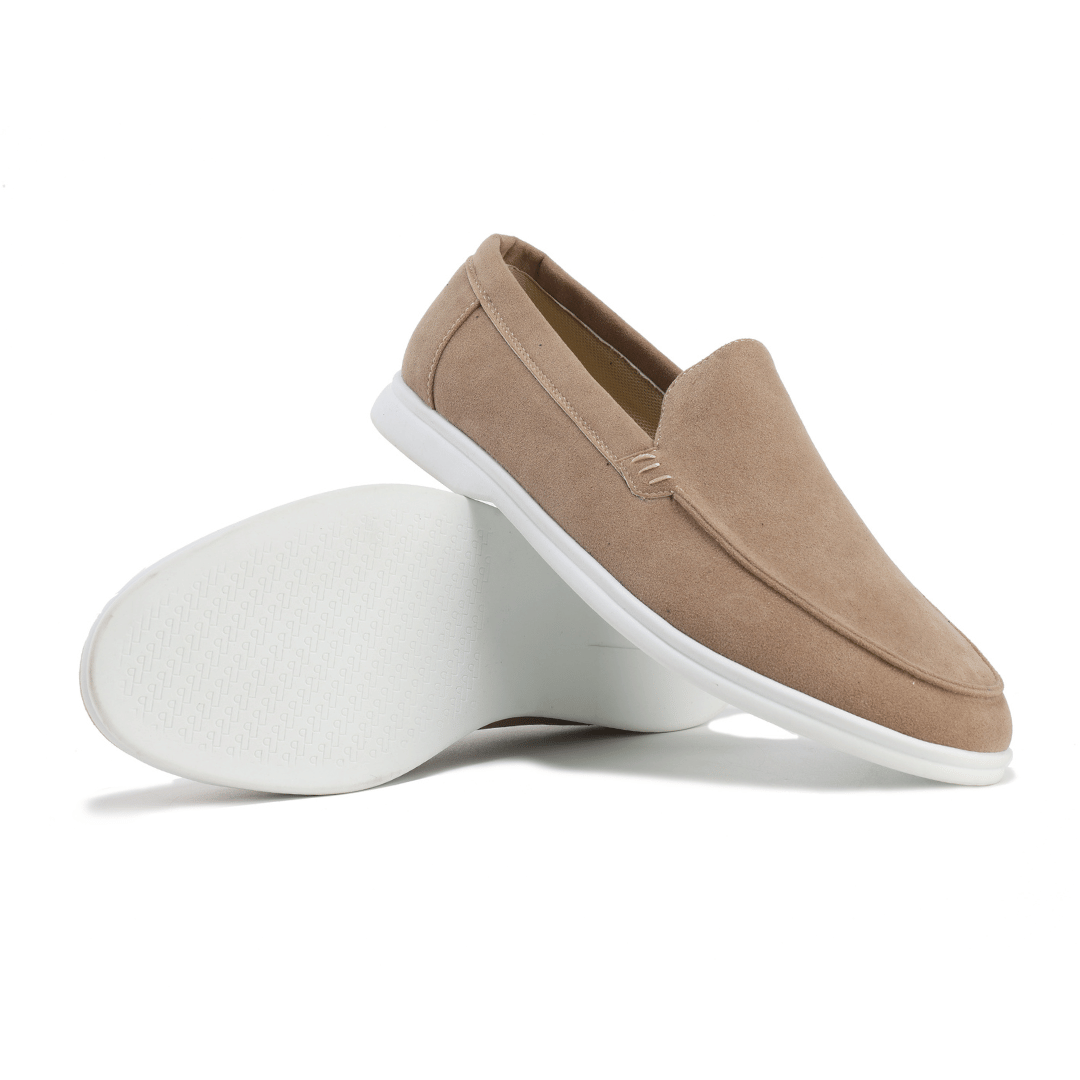 Inside view of men's slip-on loafers, revealing supportive memory foam for ultimate all-day comfort.