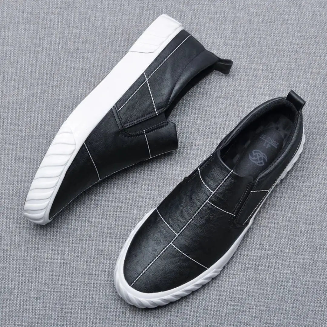 Modern men's slip-on loafers worn, highlighting their casual style, comfort, and easy on/off design.