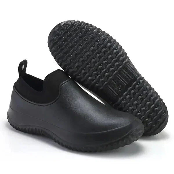 Black men's slip-on work shoes; water-resistant, easy wear & comfortable for job sites.