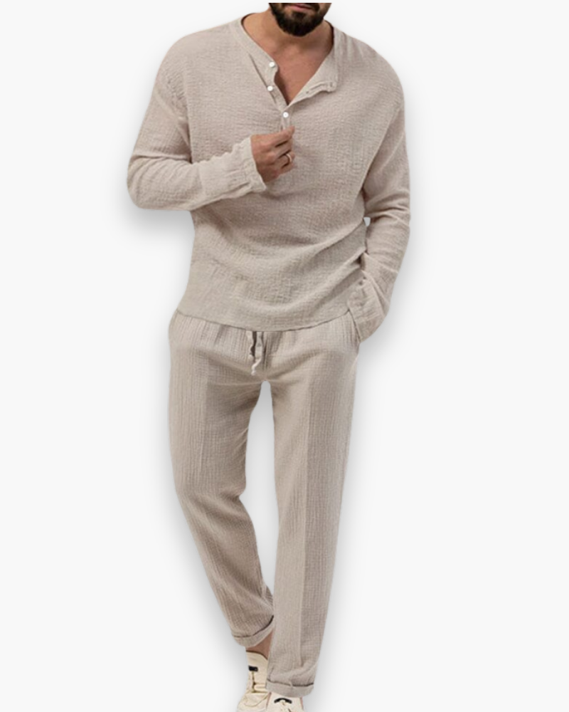 Lightweight men's summer two-piece set: relaxed fit top & matching trousers. Comfortable smart casual outfit.