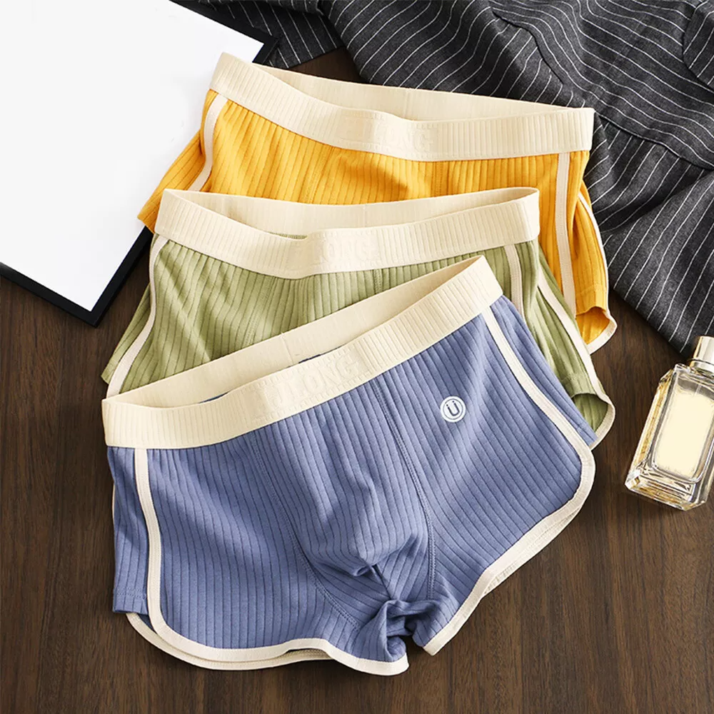 Men's soft color-block boxer briefs with elastic waistband for daily comfort & support.