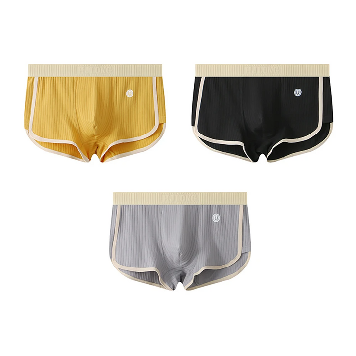Men's color-block boxer briefs feature soft, supportive fit & elastic waistband; ideal for daily comfort.
