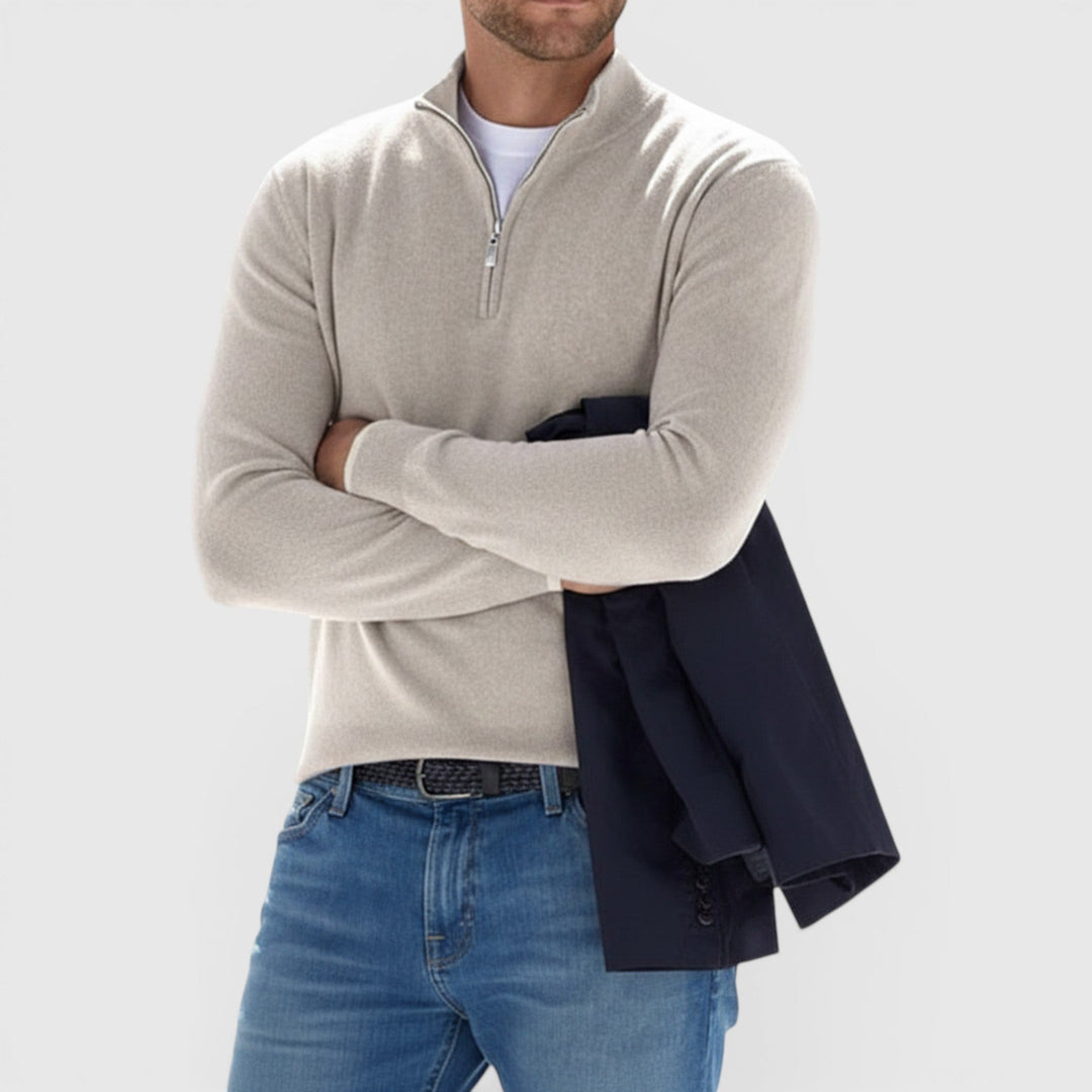 Soft knit men's quarter zip sweater with polo collar. Comfortable and versatile fashion pullover.