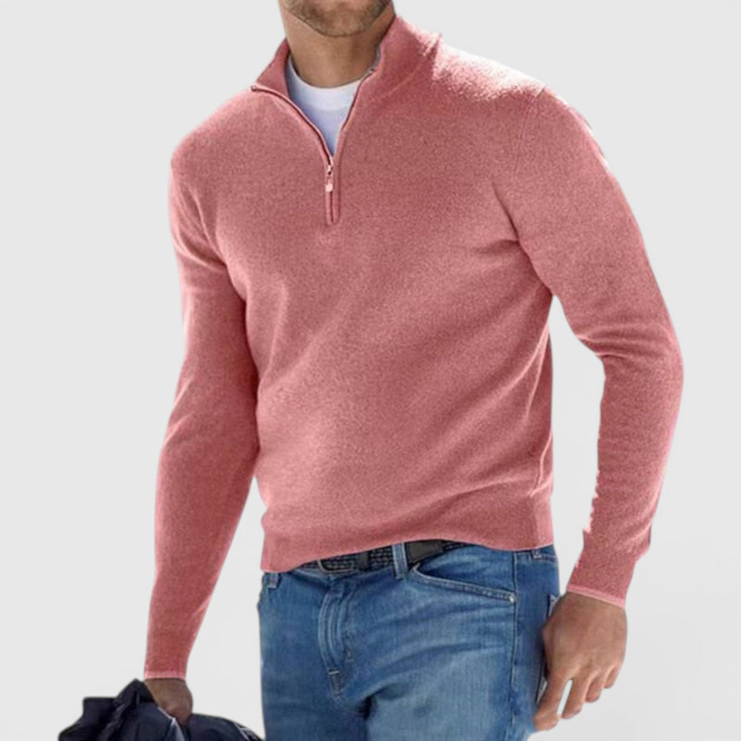 Long sleeve men's soft knit quarter zip polo sweater. Versatile and essential pullover for comfort.