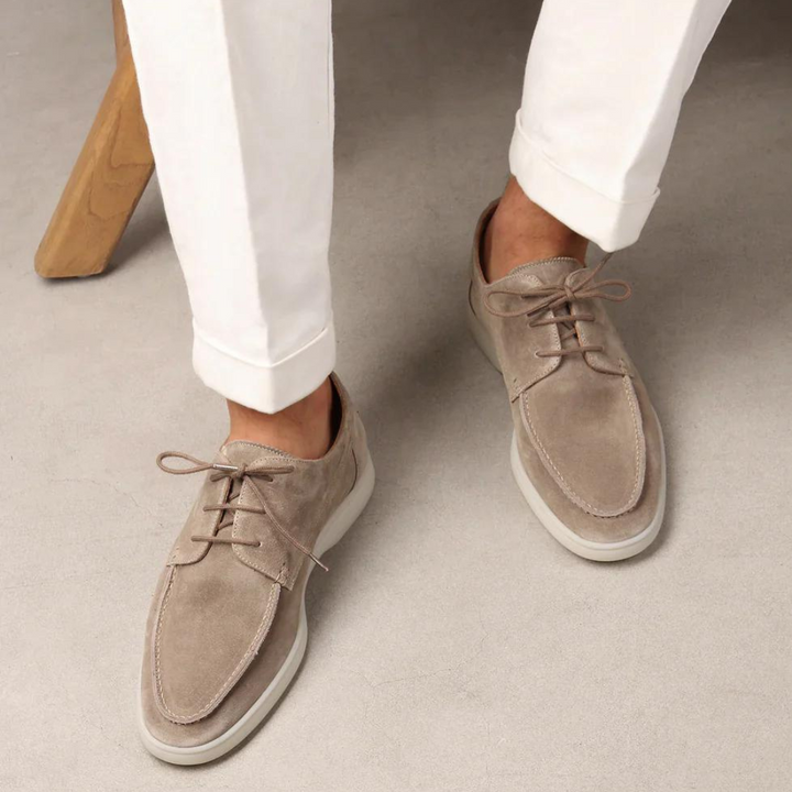 Stylish men's black suede casual sneakers. Comfortable lace-up shoes for everyday wear and versatile style.