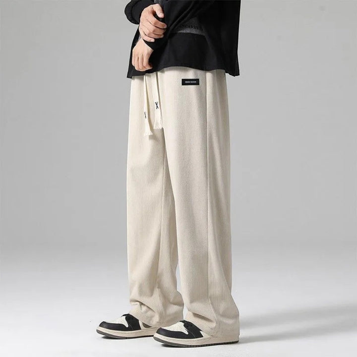 Stylish men's soft wide leg drawstring sweatpants, offering a relaxed fit for ultimate comfort & casual wear.