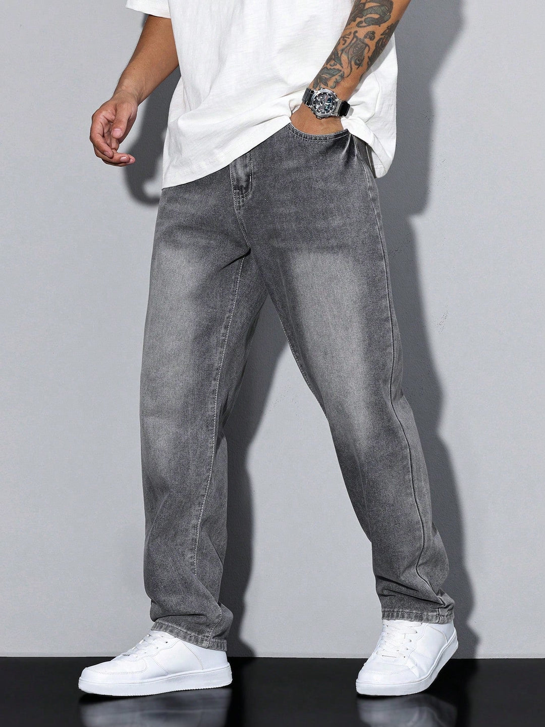 Men's solid color denim jeans with a relaxed fit, ideal for casual everyday wear and comfortable style.
