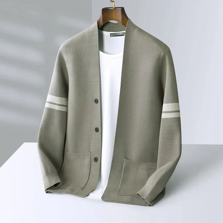 Elegant men's autumn wear cardigan, buttoned up, showing off its classic design and striped sleeves.