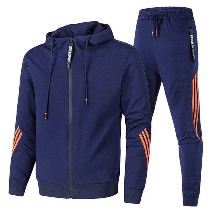 New men's activewear tracksuit featuring a comfortable zip-up top & matching joggers. Ideal for sports or lounge.