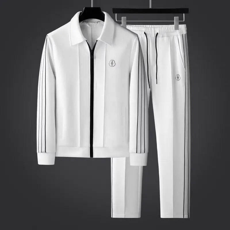 Men's blue activewear tracksuit set, featuring a zip-up jacket & joggers for ultimate comfort.