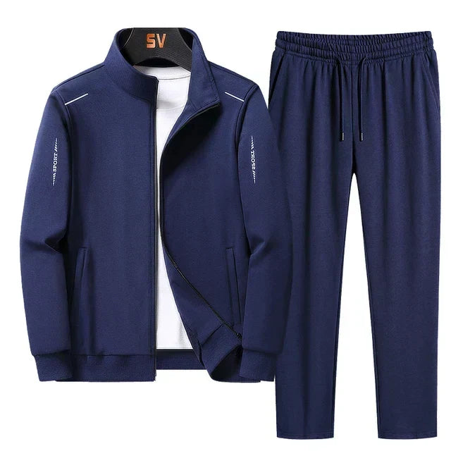 Comfortable men's activewear tracksuit set, featuring a zip-up jacket & joggers. Great for gym or casual fashion.