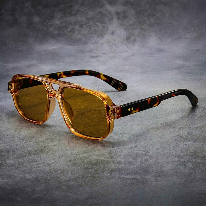 Stylish men's square frame sunglasses. Modern design eyewear with tinted lenses for optimal sun protection.
