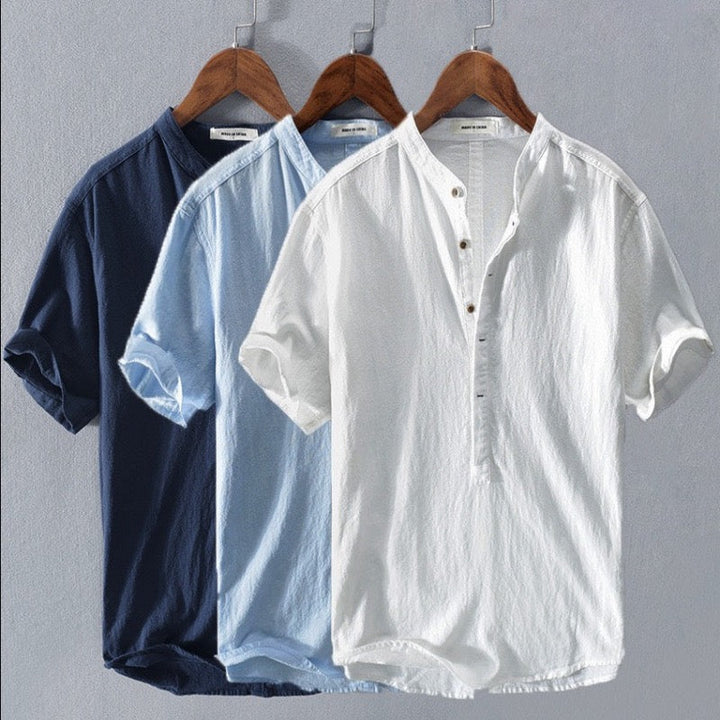 Versatile men's stand collar short sleeve shirt. A fashionable button-up summer top for casual and smart casual looks.