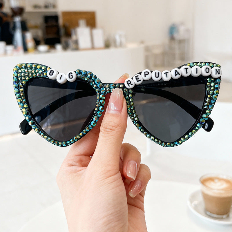 Men's statement heart-frame sunglasses with a unique design, perfect for fashion.