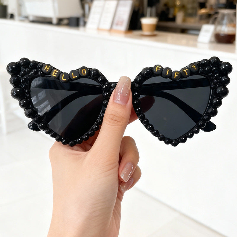 Men's bold heart-frame sunglasses, adorned with dazzling rhinestone accents.