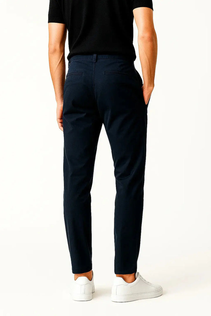 Man wearing comfortable straight fit stretch chino pants, showcasing modern everyday style and comfort.
