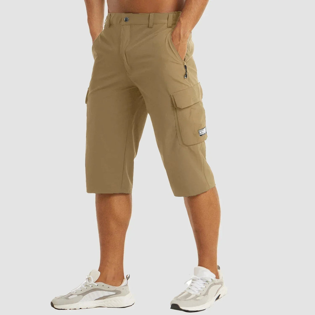 Men's stretch cargo Bermuda shorts for comfort & utility. Ideal for active summer days & casual wear.